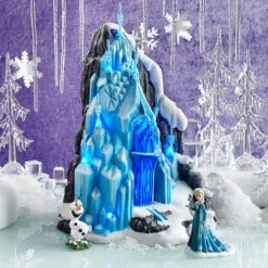 Department 56 12" Pre-Lit Blue And White Disney Frozen Elsa Ice Palace Christmas Tabletop Decor 7 Department 56 12" Pre-Lit Blue And White Disney Frozen Elsa Ice Palace Christmas Tabletop Decor -Christmas Decoration Store dept 56204048962 3 17244.1599268856