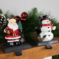 Northlight Set Of 2 Santa And Snowman Christmas Stocking Holders 5.5" -Christmas Decoration Store northlight dw15130 styled 2 82161.1691247511
